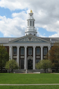 Harvard University building on campus with green grass