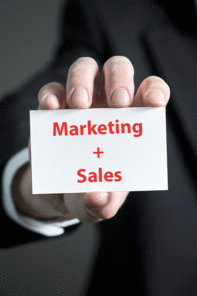 Business card that reads: Marketing + Sales
