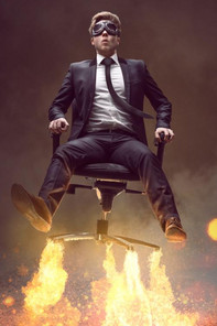 Pic of a MBA graduate flying away on an office chair