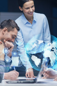 smiling female boss talking to business team