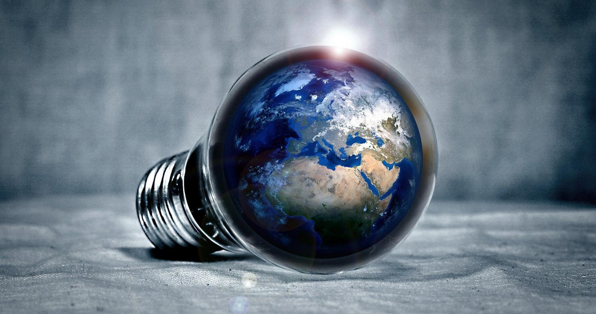 Pic of a lightbulb with the globe in it, symbolic for energy transformation