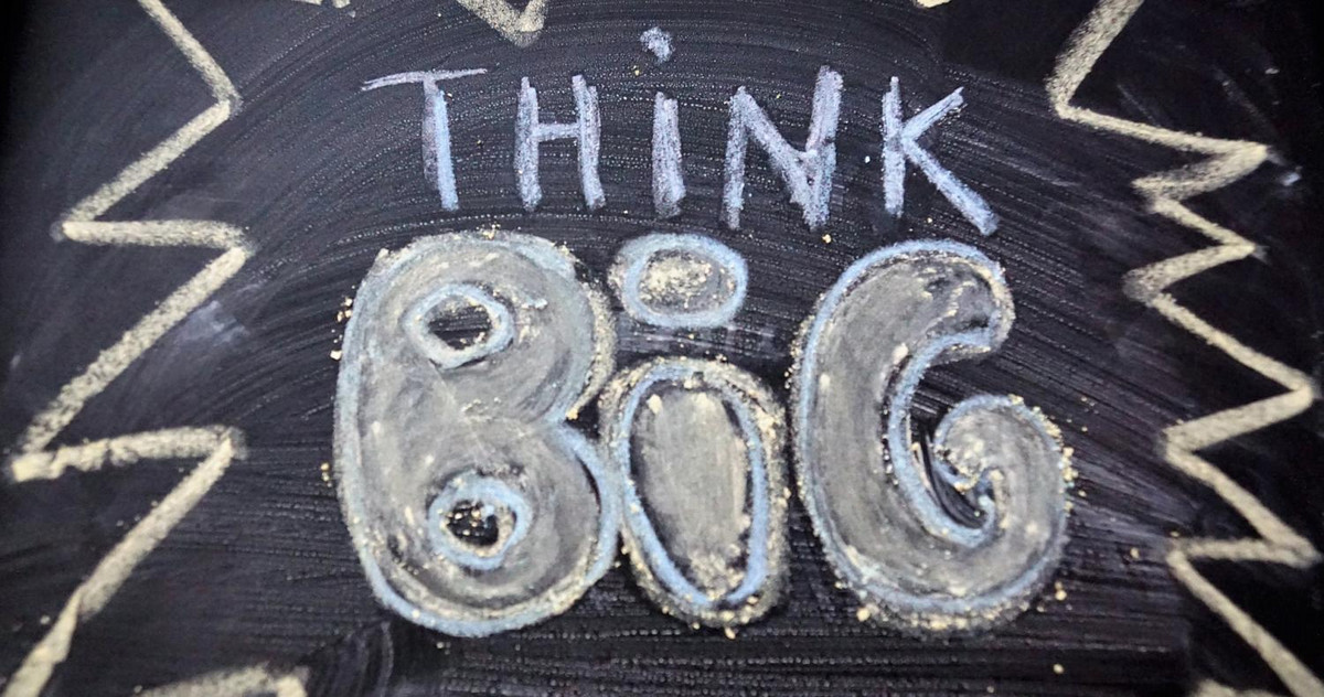"Think Big" written on a chalkboard