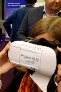 Woman holds virtual reality glasses