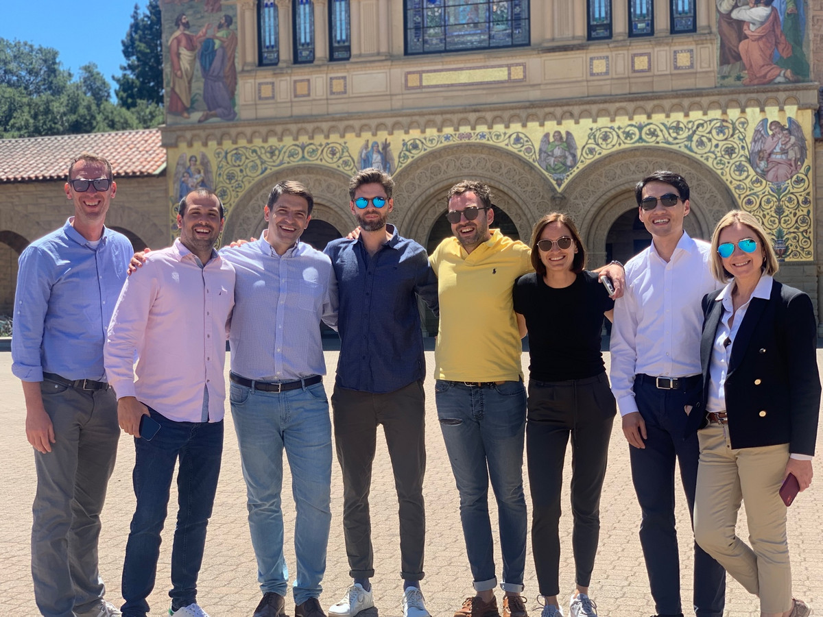 A few of us taking a walk around the campus at Stanford