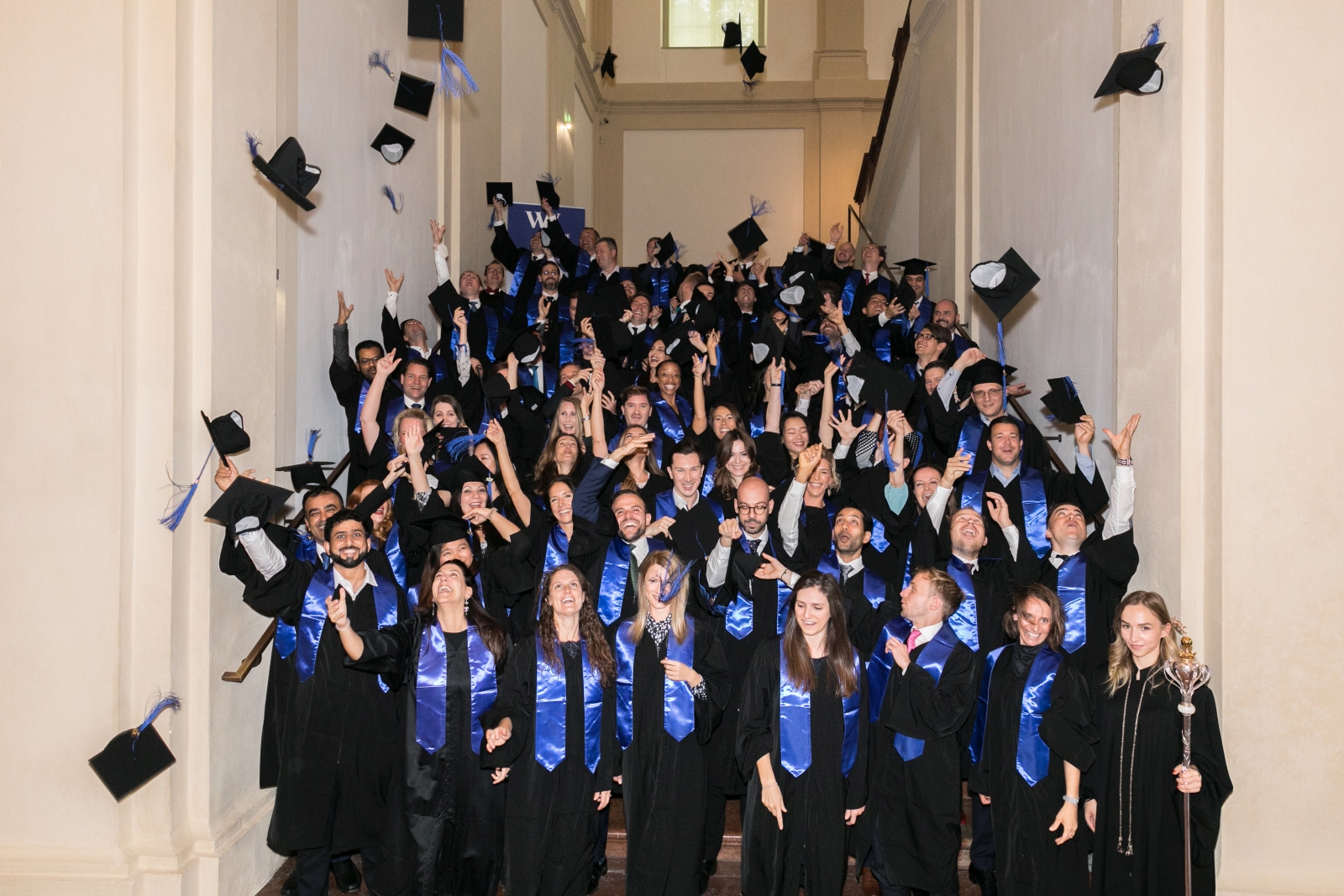 Yury among his class members at their MBA Graduation ceremony in Vienna